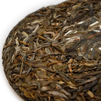 Pressed Raw Pu-erh Tea - Sheng pu-erh from tea trees from Laobanzhang village 200g, 