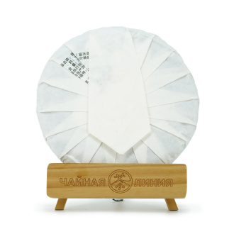 Pressed Rip Pu-erh Tea - Shu Puer 2022 "Jingmai Shan" from the "Xing Yang Cha" plant, 357 g, 